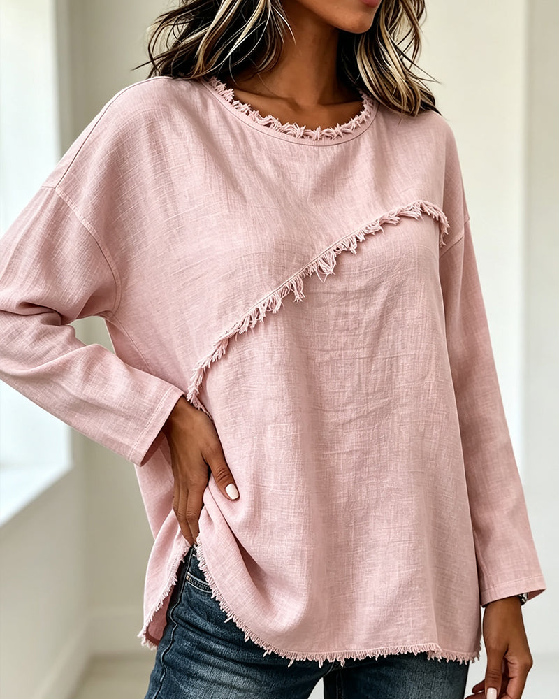 Blusa de mujer con flecos y diseño asimétrico