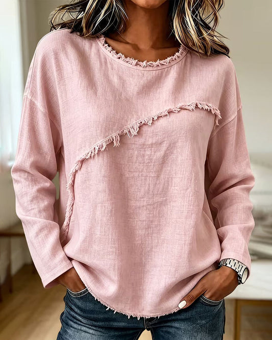 Blusa de mujer con flecos y diseño asimétrico