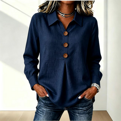 Blusa de mujer con cuello clásico y botones decorativos